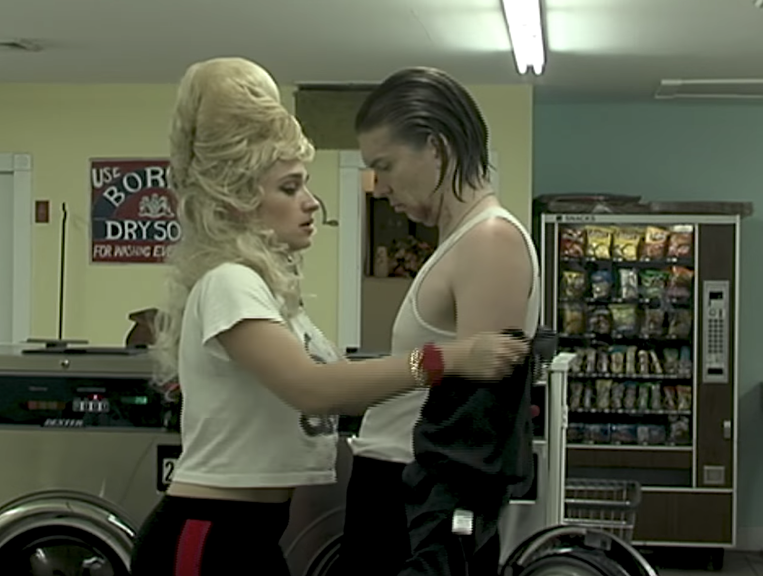 Alex Cameron reteams w/ Jemima Kirke for “Studmuffin96” video, expands tour