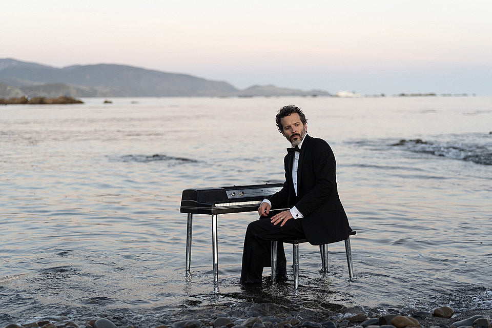 Flight of the Conchords’ Bret McKenzie announces solo album & tour, shares “A Little Tune”