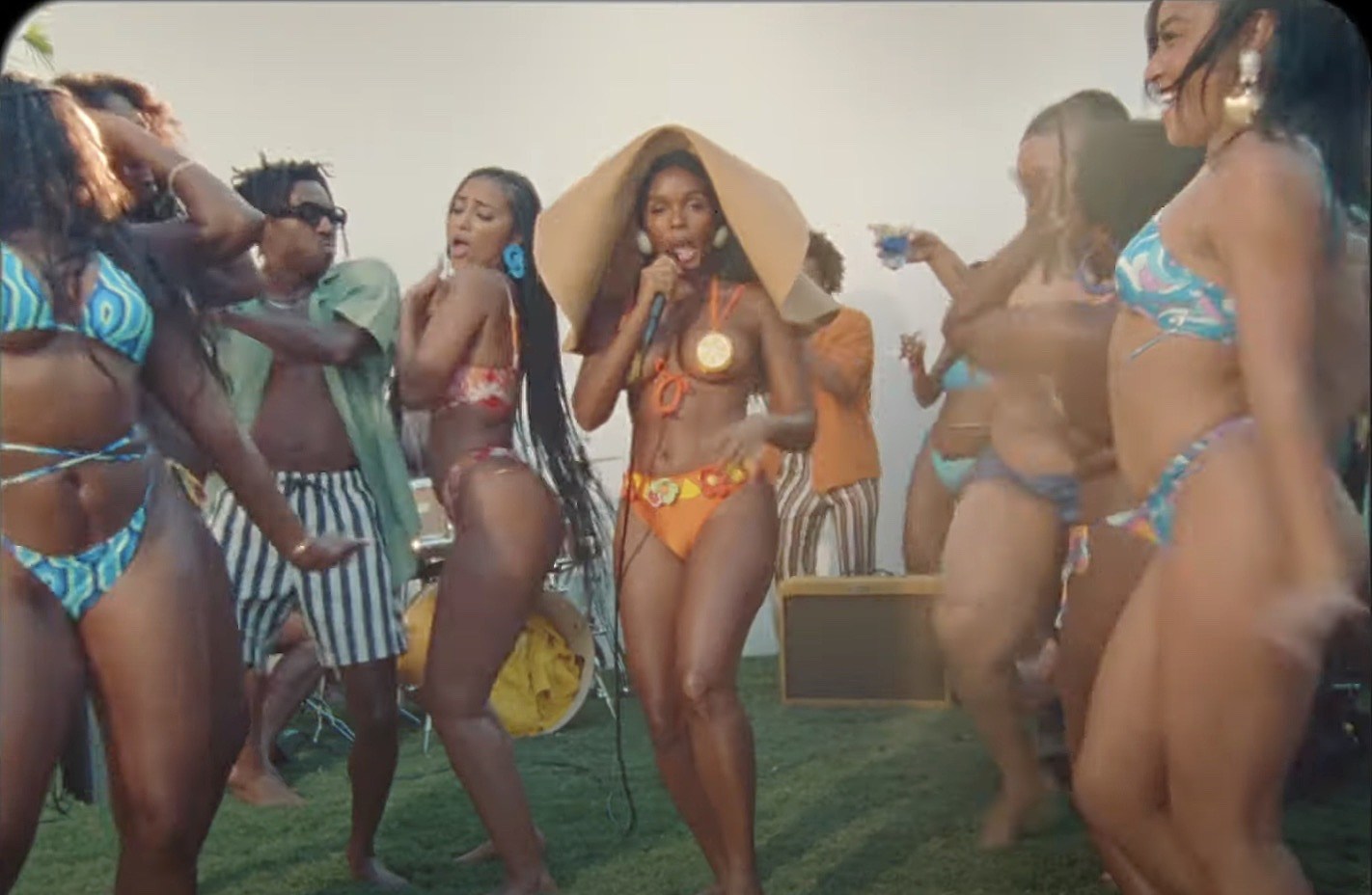 Janelle Monáe and her dancers throw a pool party in new “Water Slide” video (watch)
