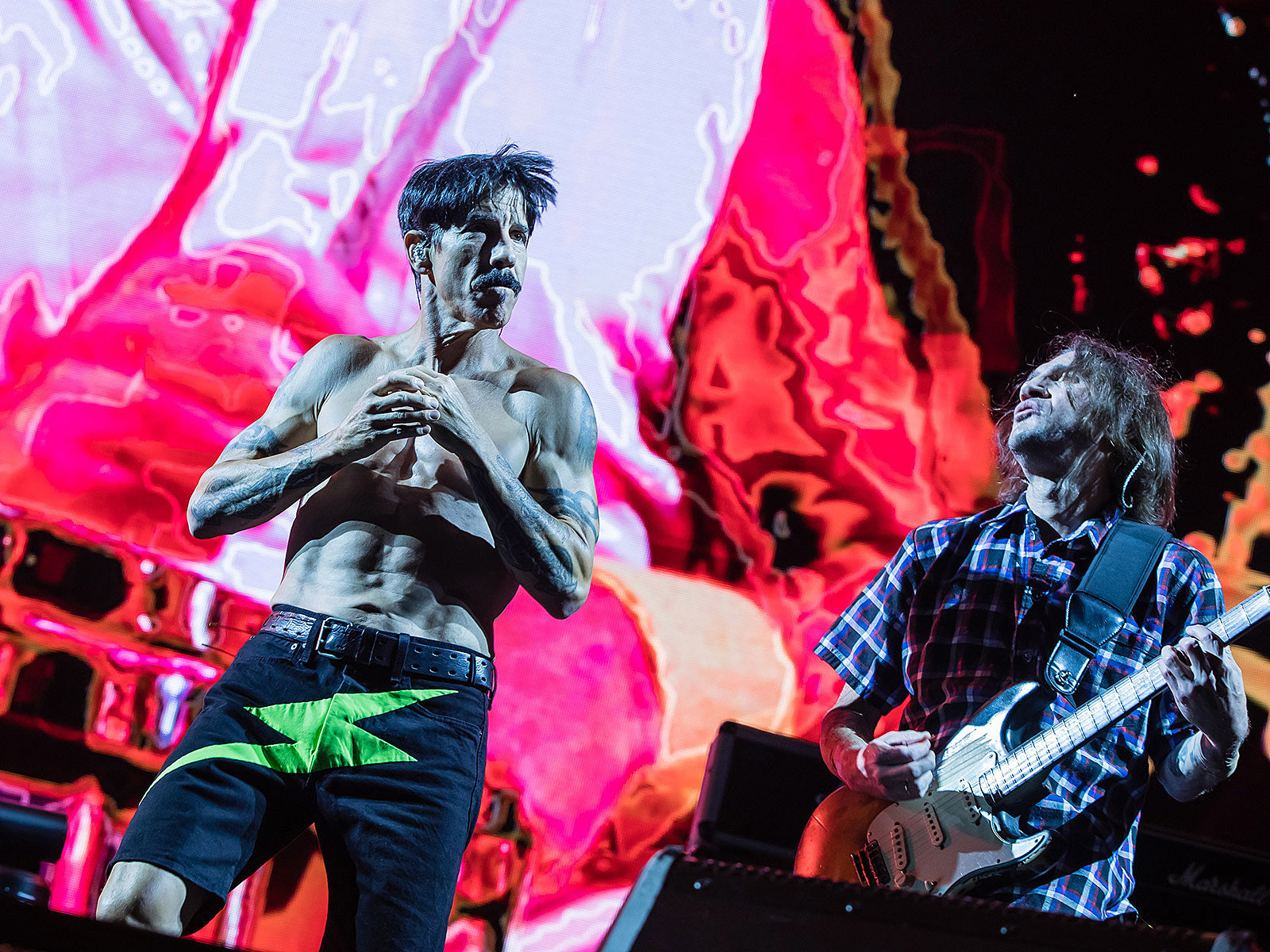 Red Hot Chili Peppers announce 2023 tour w/ The Strokes, The Mars Volta, St. Vincent & more