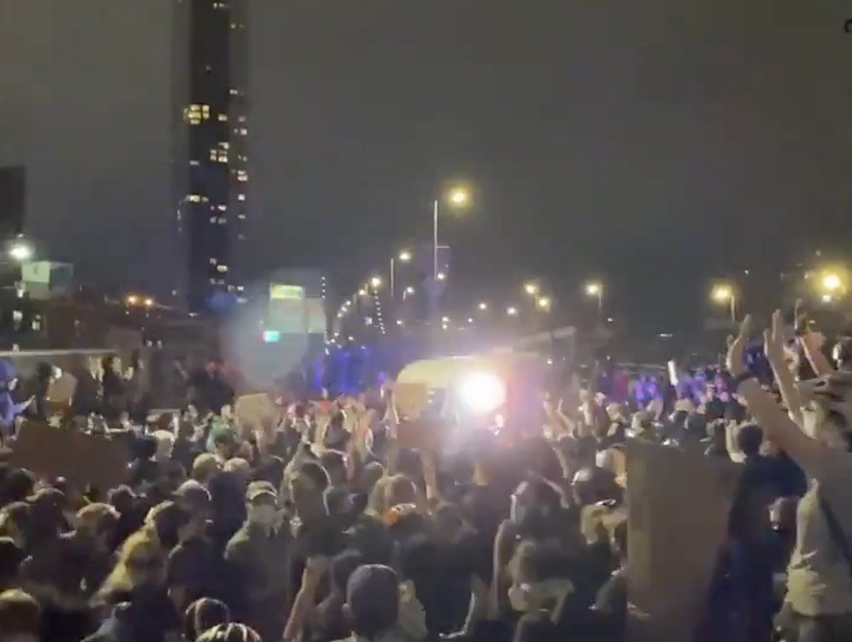 Protesters chant Ludacris’ “Move Bitch” at NYPD blocking crowd from exiting Manhattan Bridge