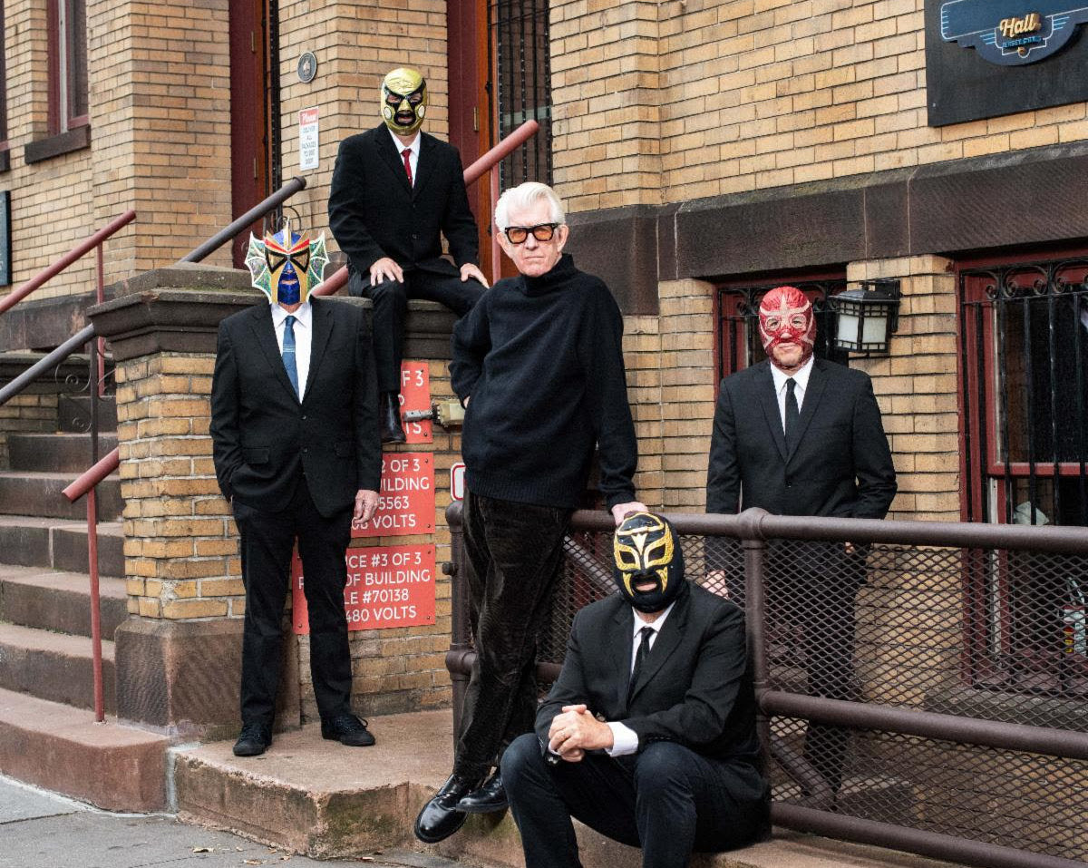 Nick Lowe announces first album in 11 years, touring with Los Straitjackets (listen to “Went to a Party”)