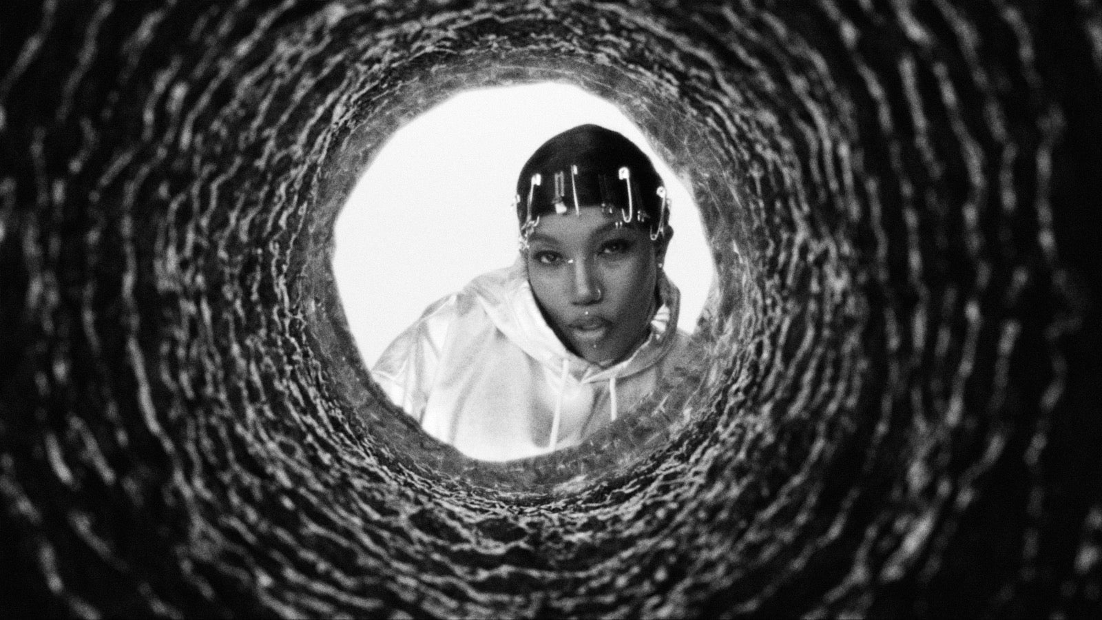Leikeli47 announces new album, takes off the mask