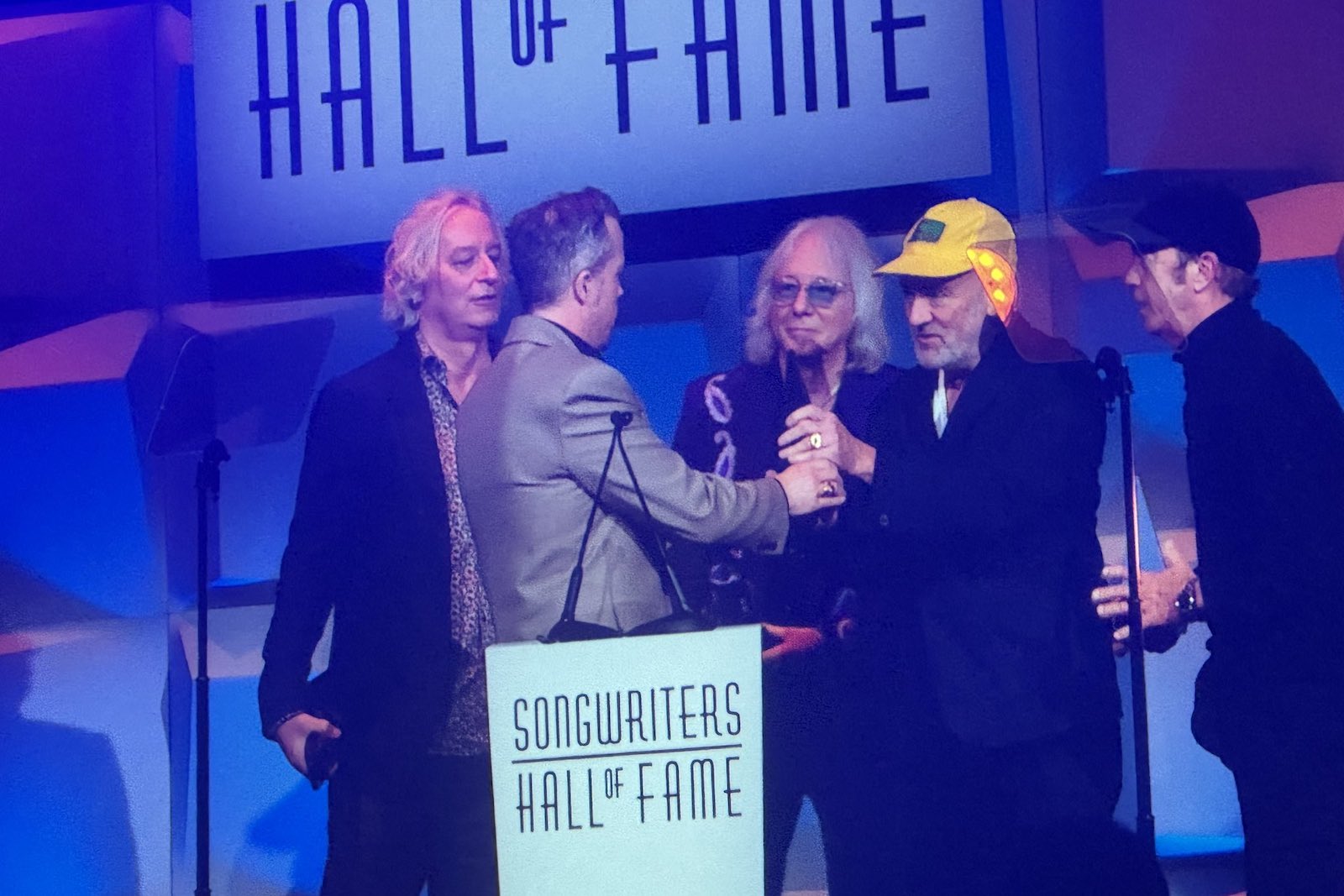 Watch R.E.M.’s original lineup reunite for first time in 17 years for “Losing My Religion”