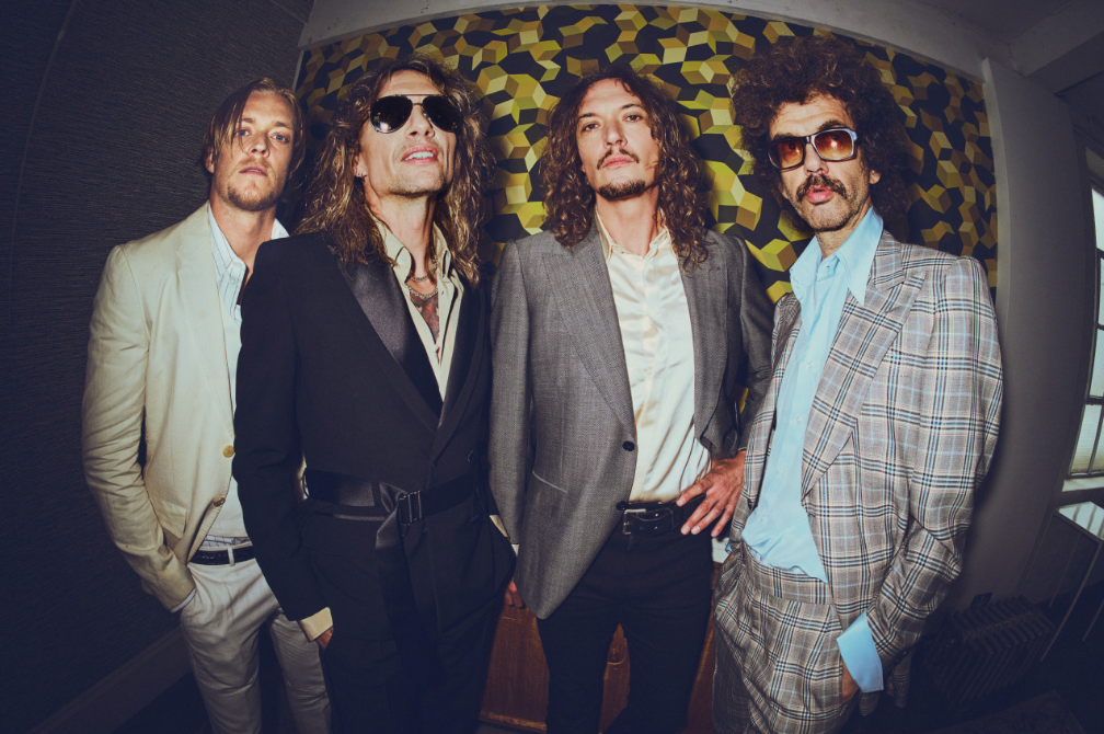 The Darkness’ Justin Hawkins talks new album, his popular YouTube channel, guitar solos, maintaining his falsetto, more