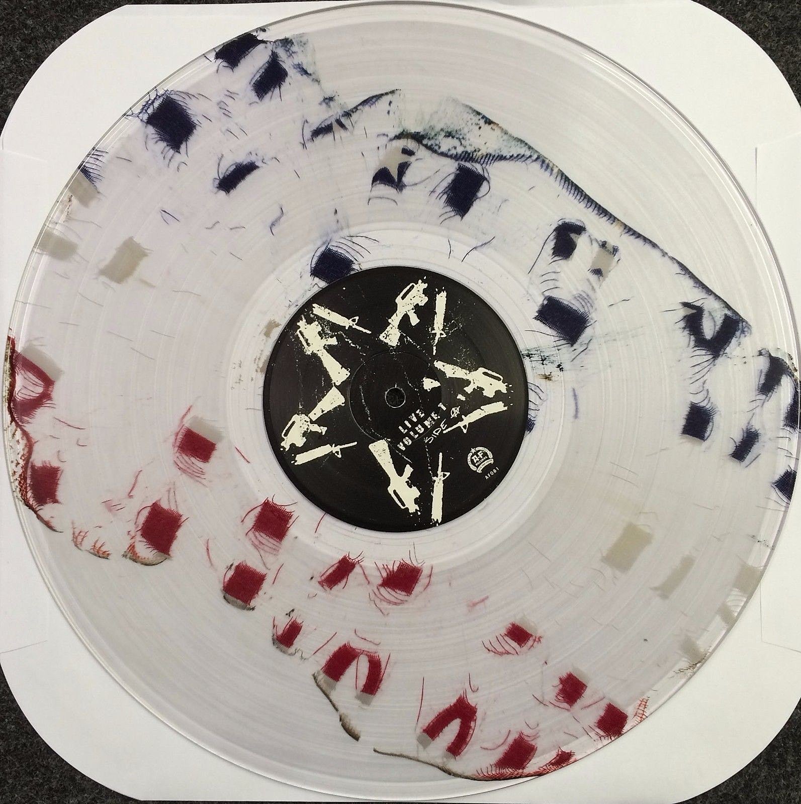Anti-Flag slam Trump, donating money from LPs pressed w/ burnt American flags