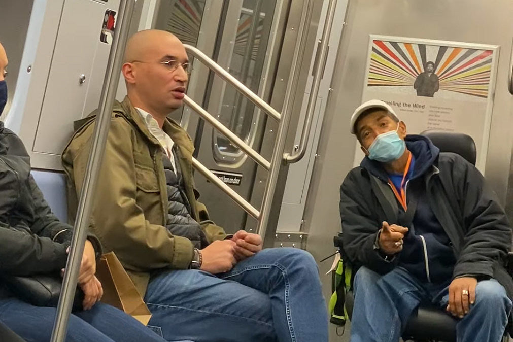 Watch subway riders try to reason with an anti-masker (video)