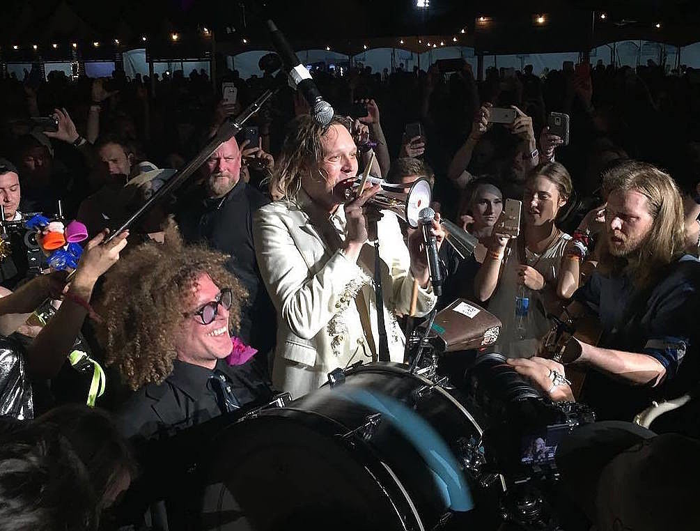 Arcade Fire held a Second Line parade for David Bowie at Panorama fest (watch)