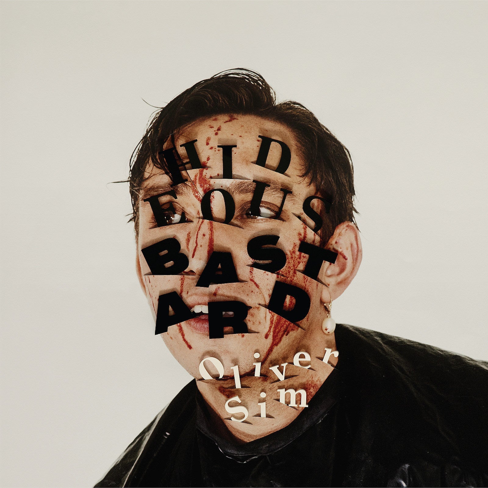 The xx’s Oliver Sim preps solo debut, shares new single “Hideous” about living with HIV