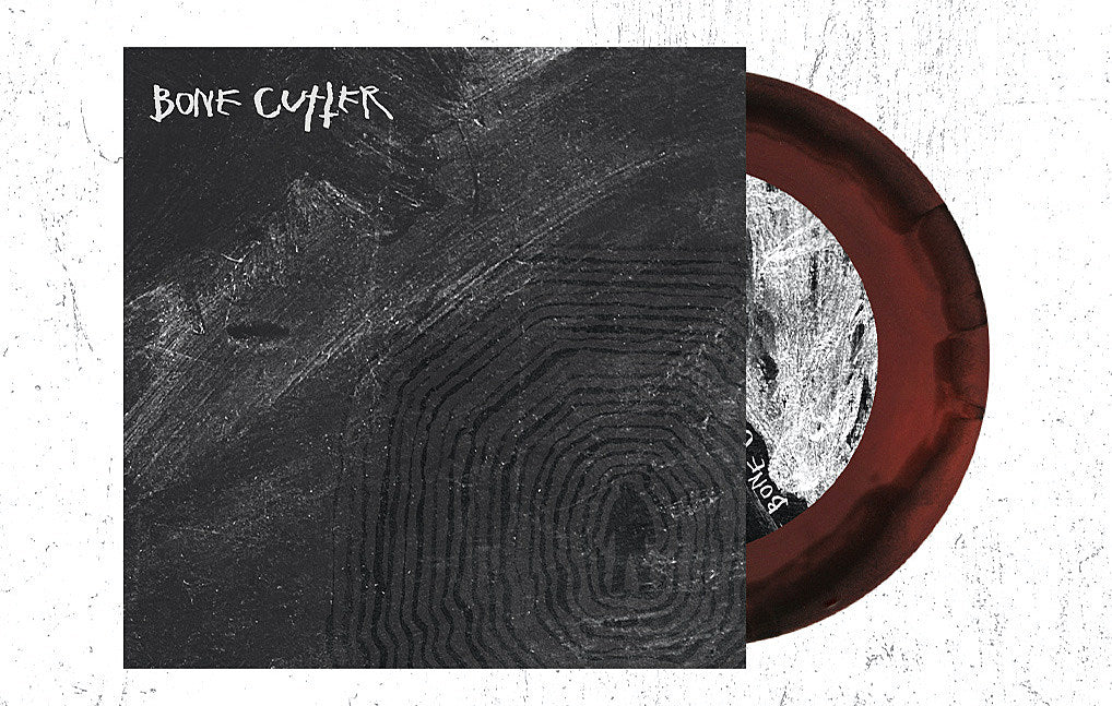 Bone Cutter’s (mem Heavy Heavy Low Low) debut EP gets vinyl release (exclusive swirl pre-order)