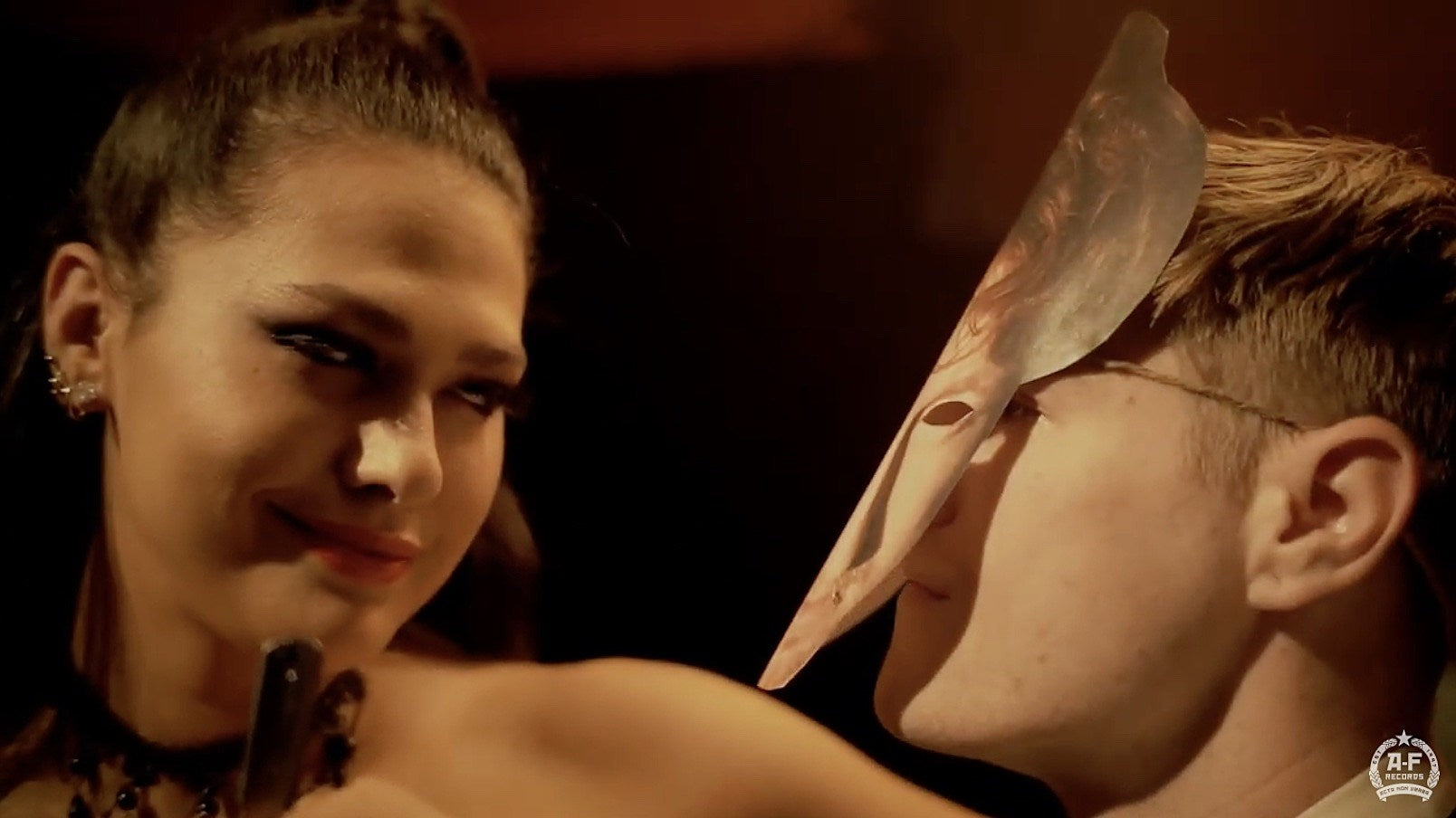 Watch Divided Heaven’s murder mystery-themed music video starring Jess Adams