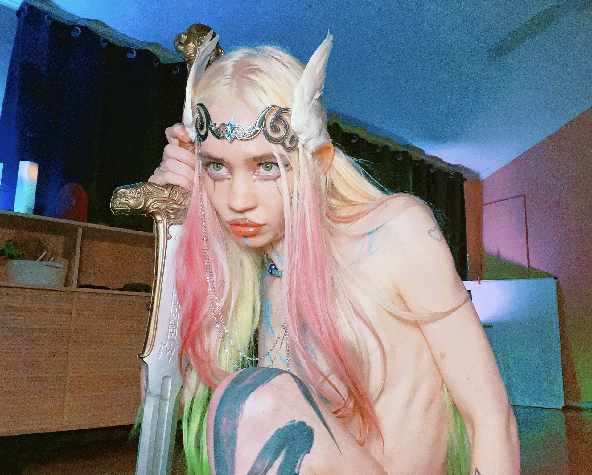 Grimes: “music is my side quest now”