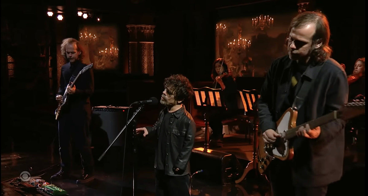 Watch Peter Dinklage sing w/ Aaron & Bryce Dessner of The National on ‘Colbert’