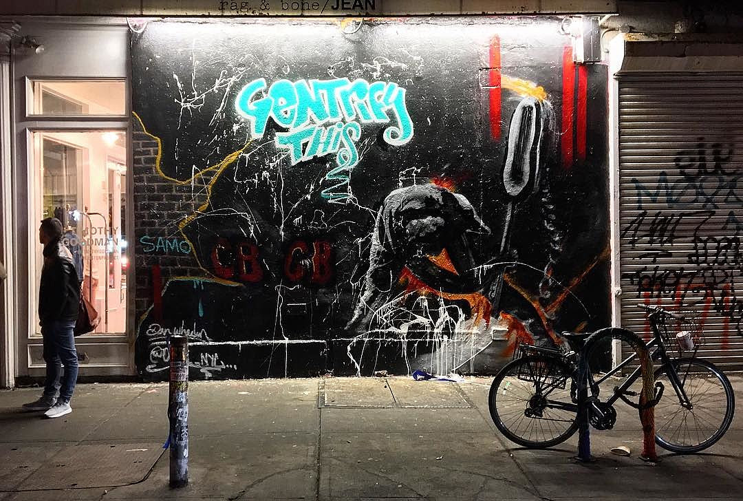 “Gentrify This” mural w/ The Clash & CBGB homage painted outside NoLIta Rag & Bone store