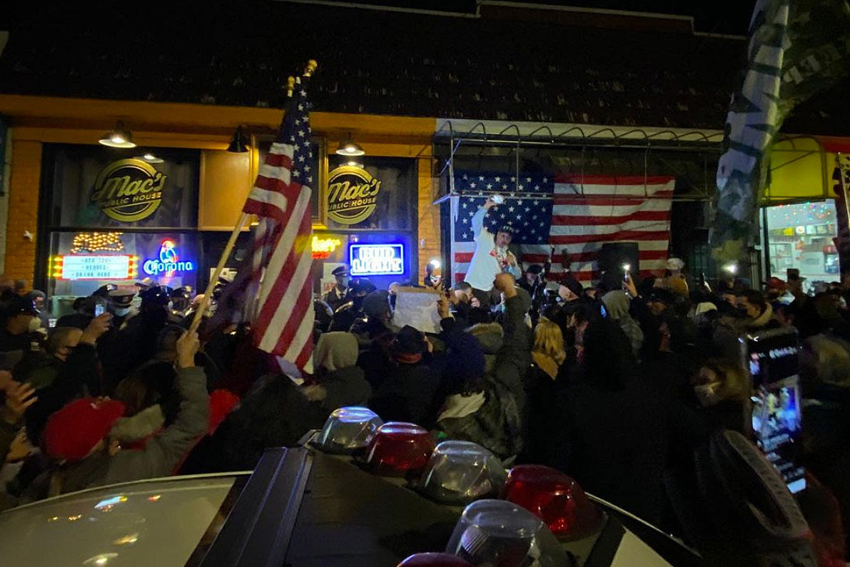 Large group of “patriots” protest outside Staten Island bar after owner’s arrest