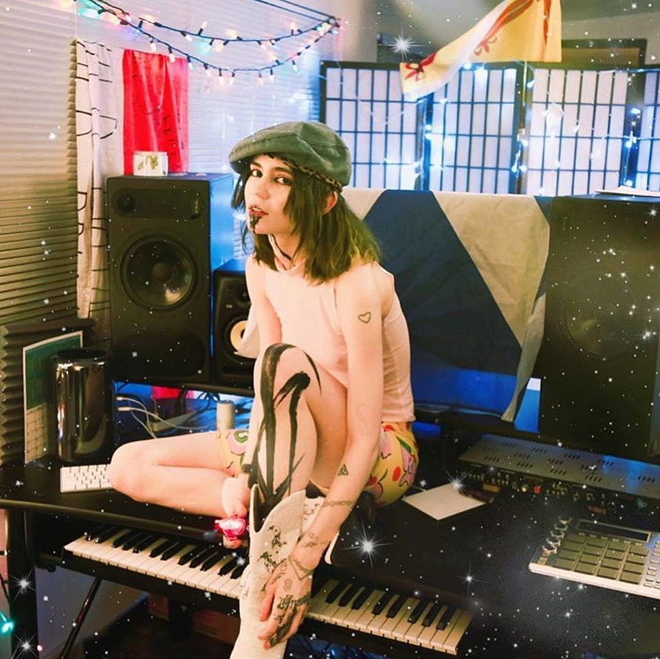 Grimes shares personal Spotify mood playlists (listen)