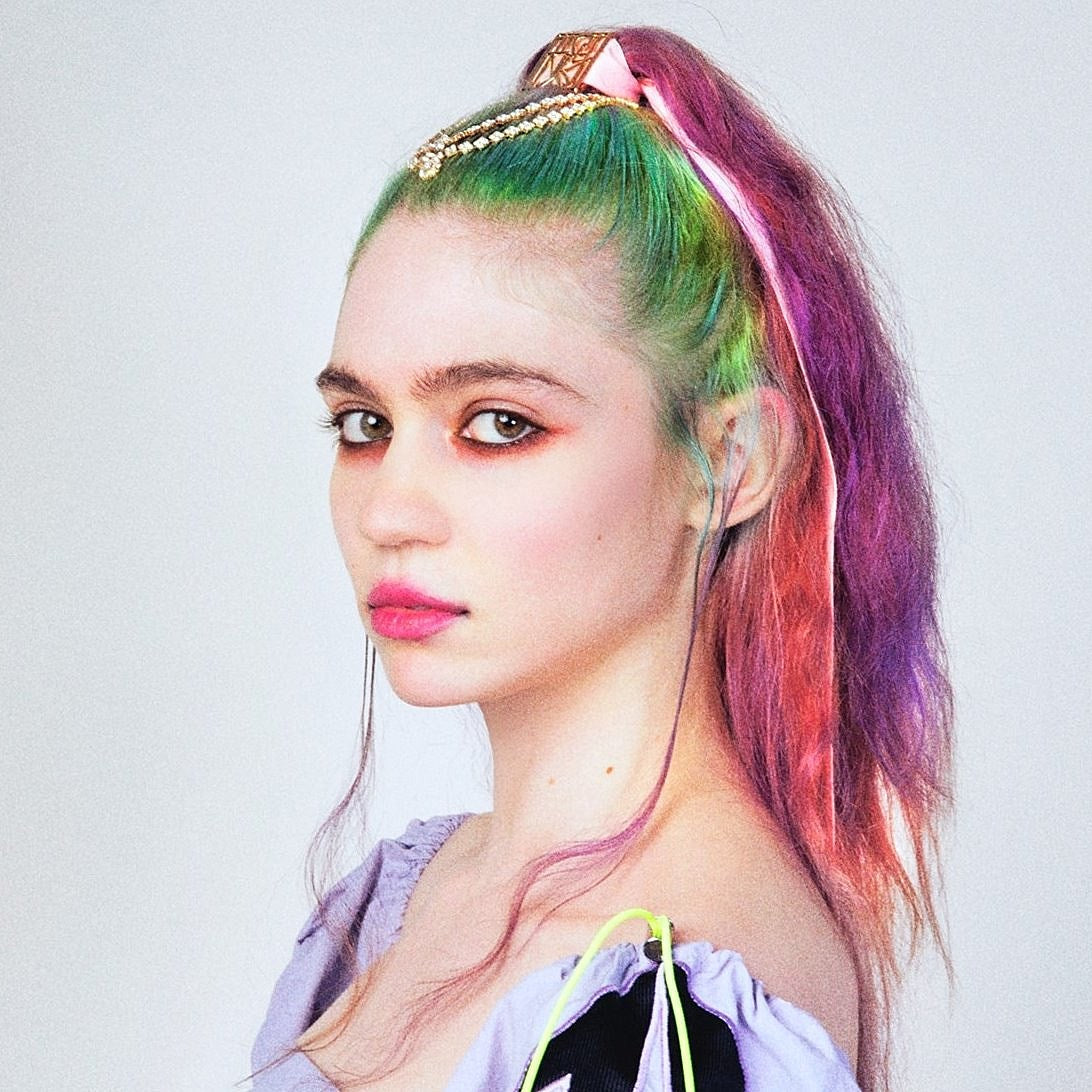 Grimes thinks “live music is going to be obsolete soon”