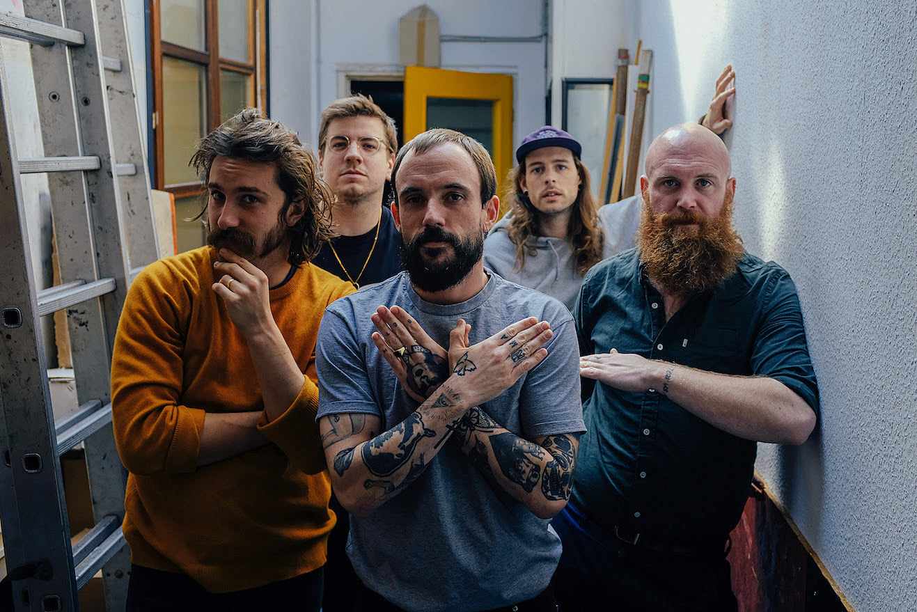 IDLES share “Mercedes Marxist,” announce fall dates with Preoccupations