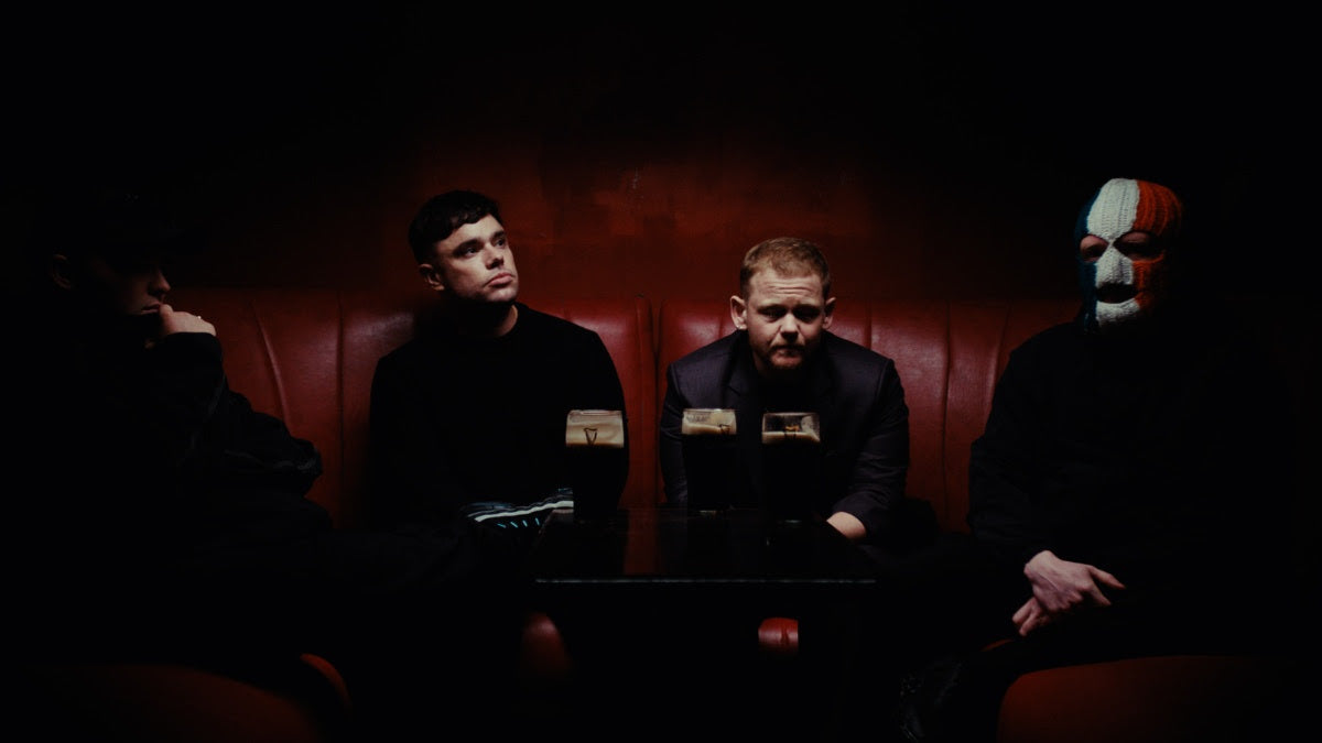 Kneecap share powerful Kae Tempest collab “Irish Goodbye” (watch the short film)