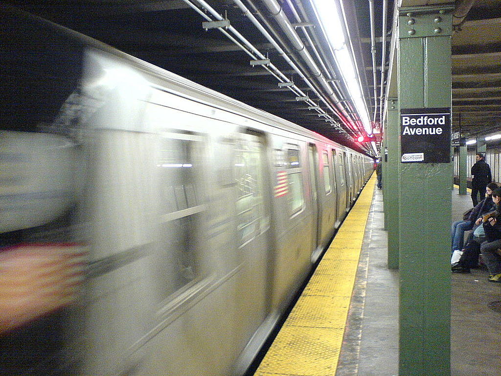 a woman got trapped under an L Train at Bedford Ave