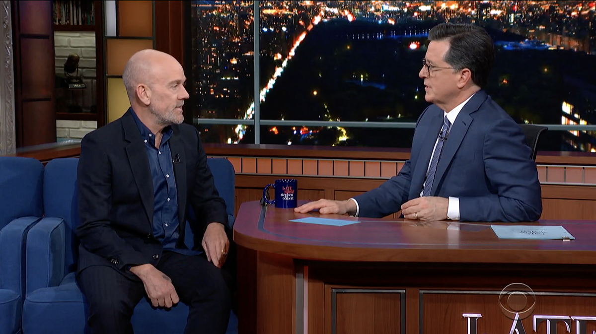 Michael Stipe talks solo career, telling Donald Trump to shut up at a concert, & more on ‘Colbert’