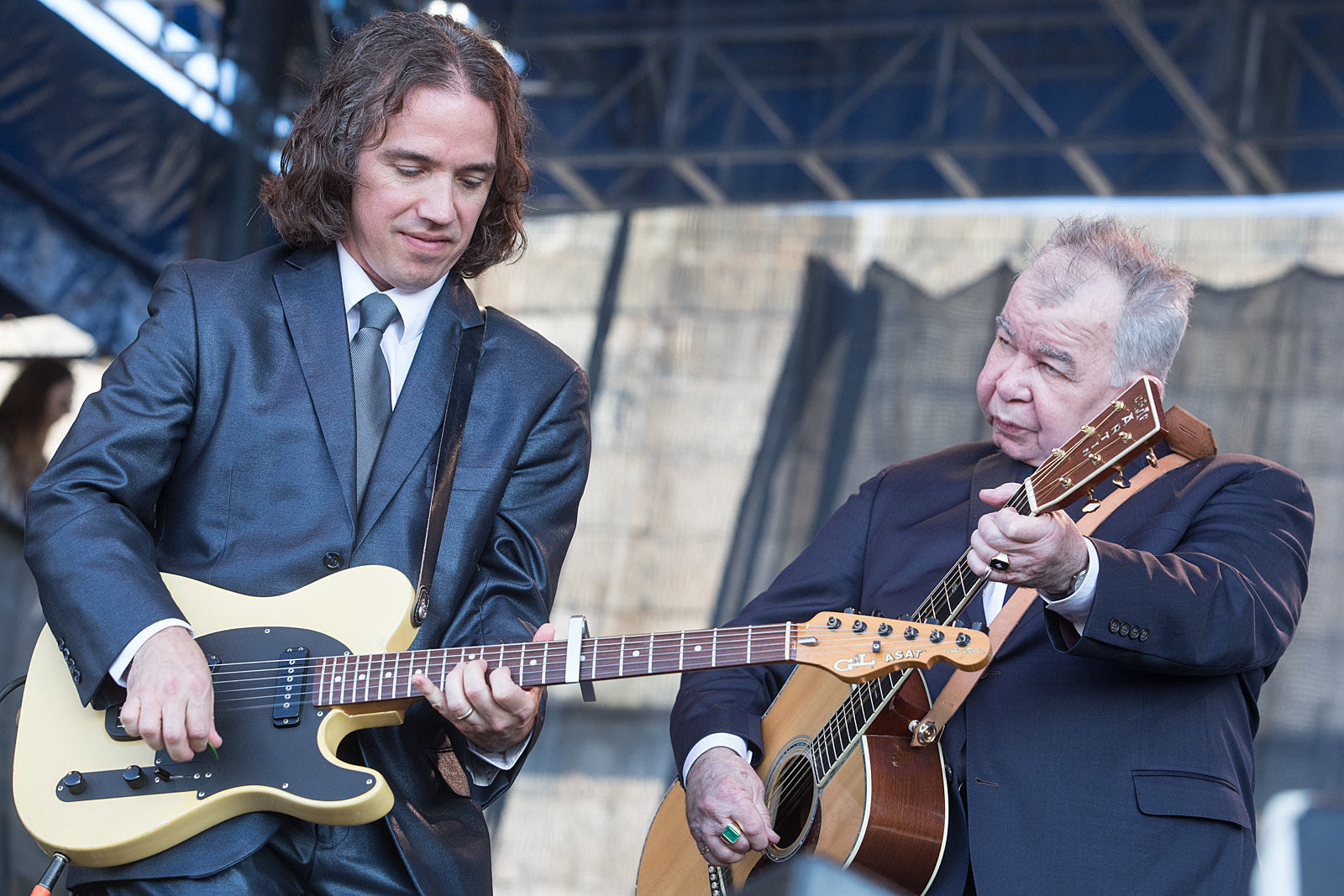 John Prine remains in ICU with COVID-19; his wife Fiona shares an update.