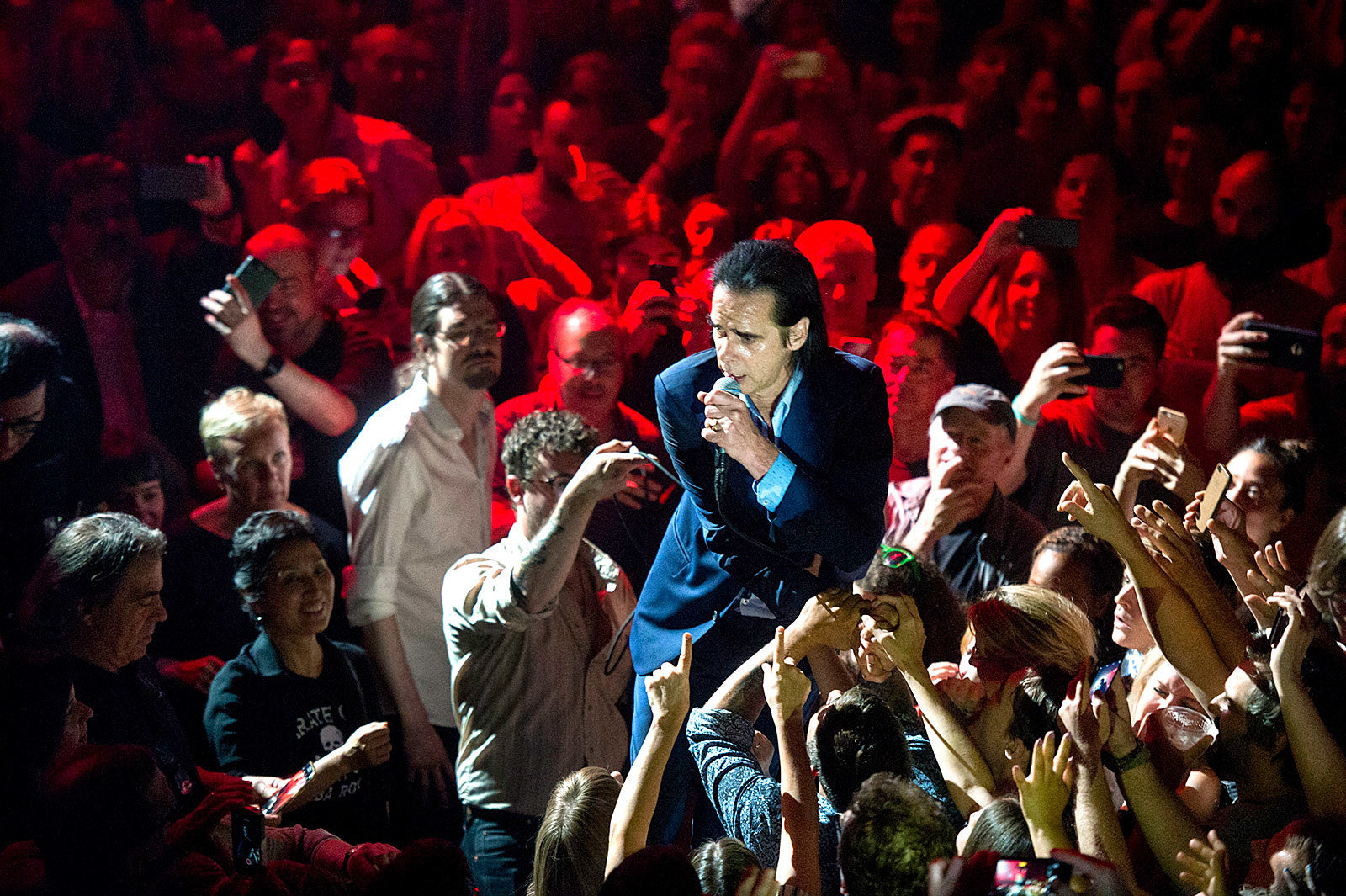 Nick Cave talks pulling together while “living through a frightening and deeply uncertain time”
