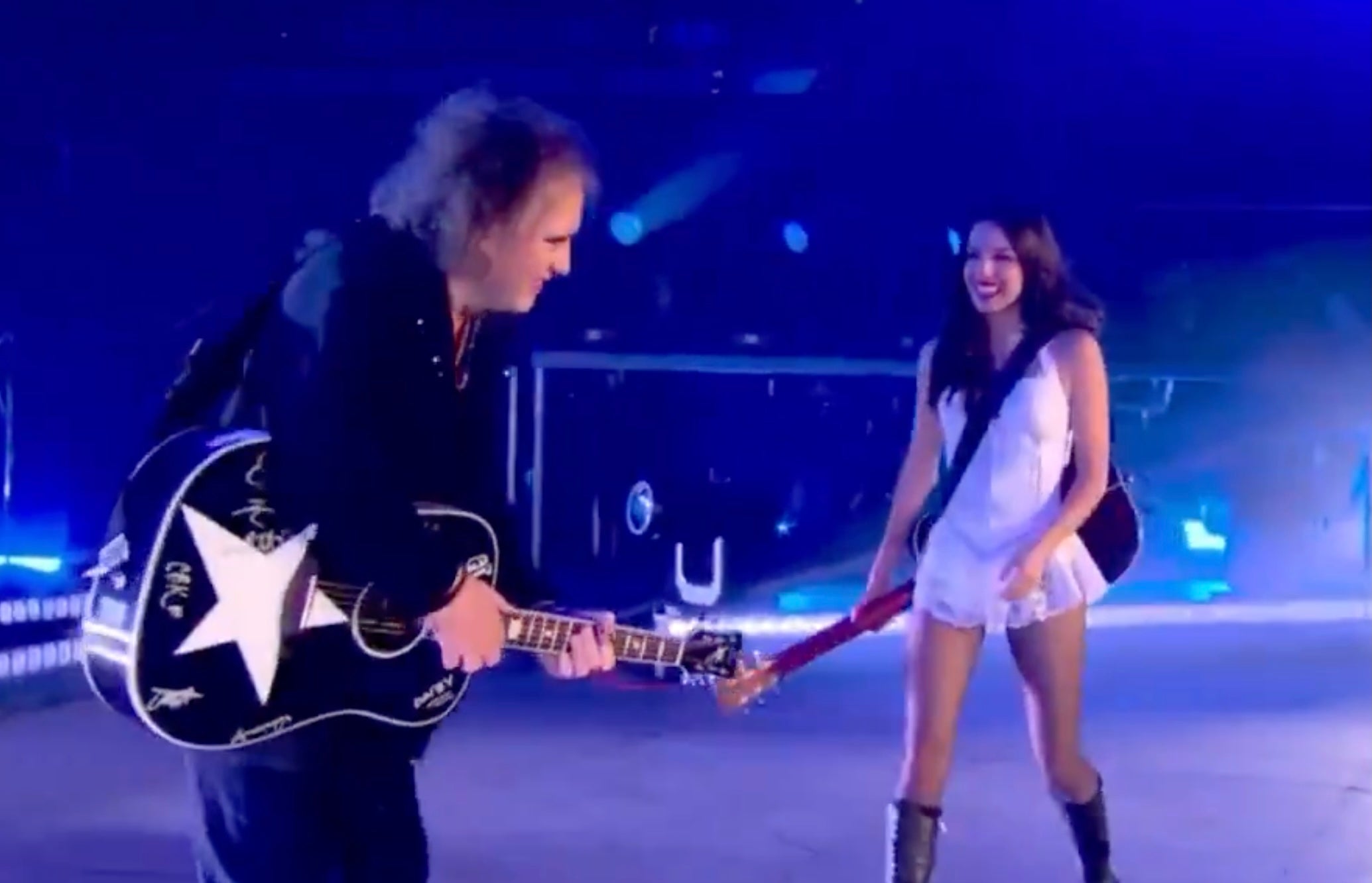 Watch Robert Smith join Olivia Rodrigo at Glastonbury for The Cure’s “Friday I’m in Love” and “Just Like Heaven”
