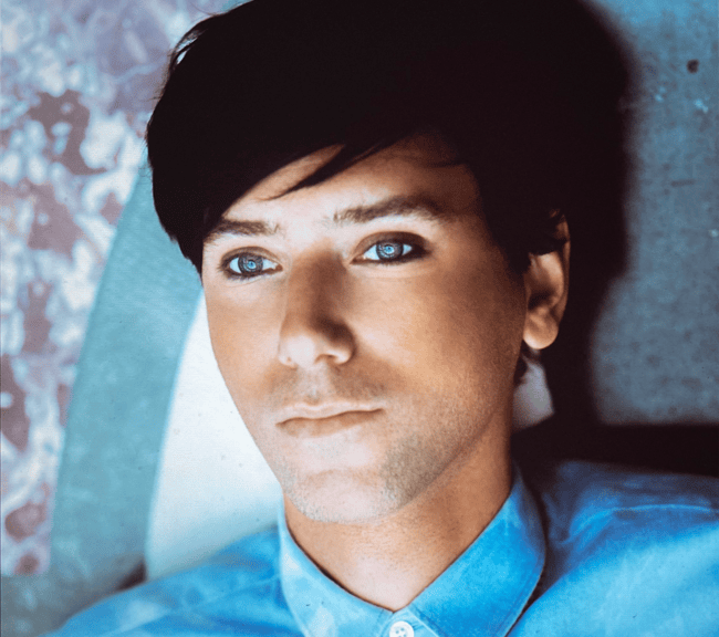Tiga announces 1st album in a decade ft Boys Noize & Fcukers, shares “ECSTASY SURROUNDS ME”