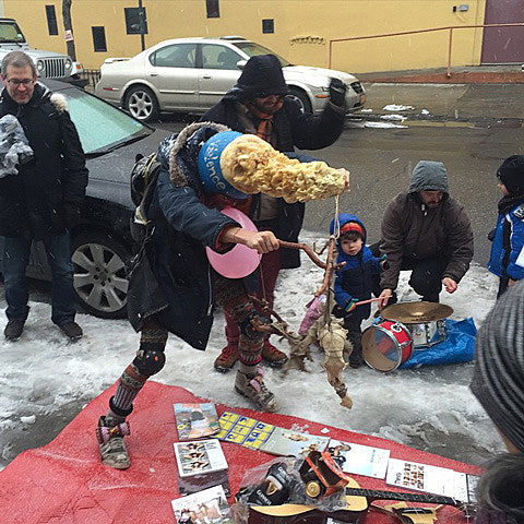 protest outside VICE right now, attempting to levitate its offices into the East River